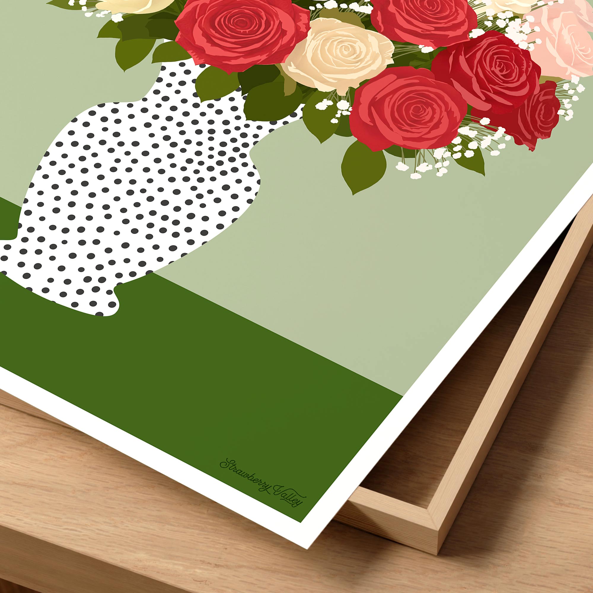 Floral arrangement with red and beige roses on a green background, partially covering a polka dot pattern.