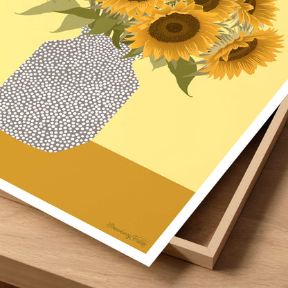 Framed artwork with sunflowers on a yellow background